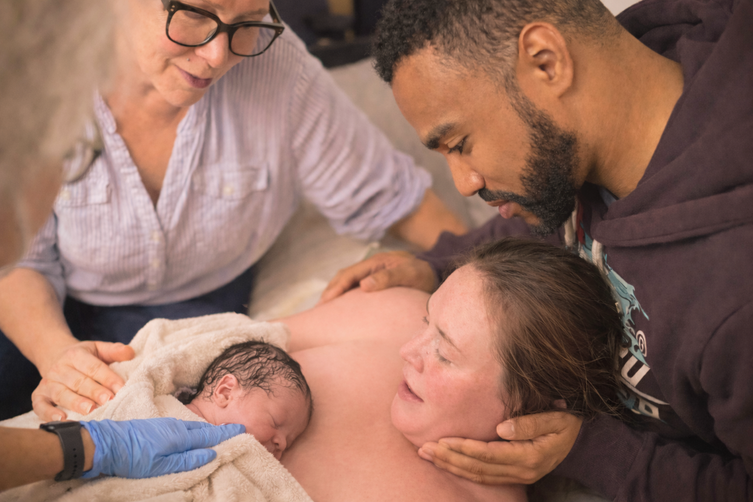 Warm family moment after birth