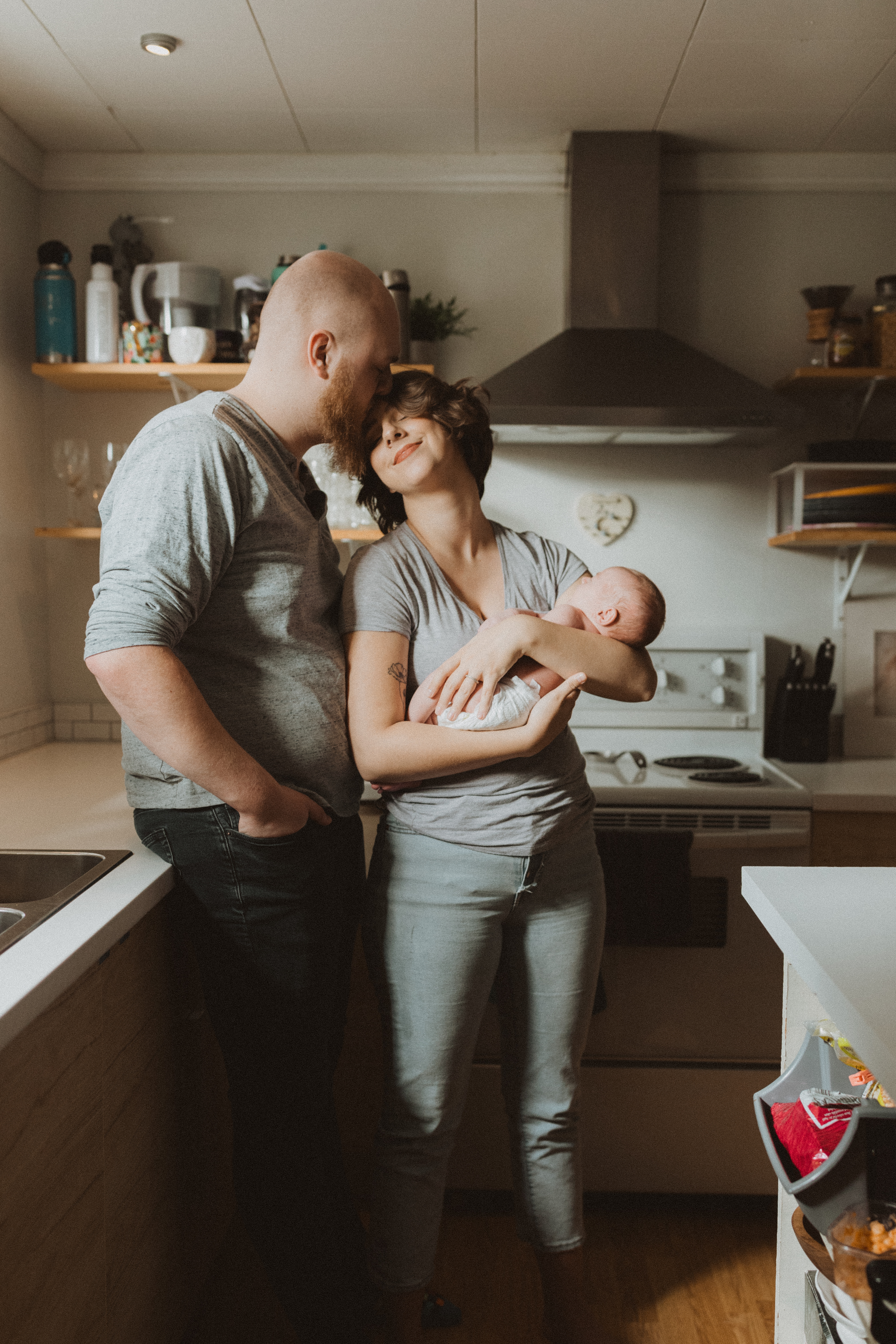 Parent gently caring for baby